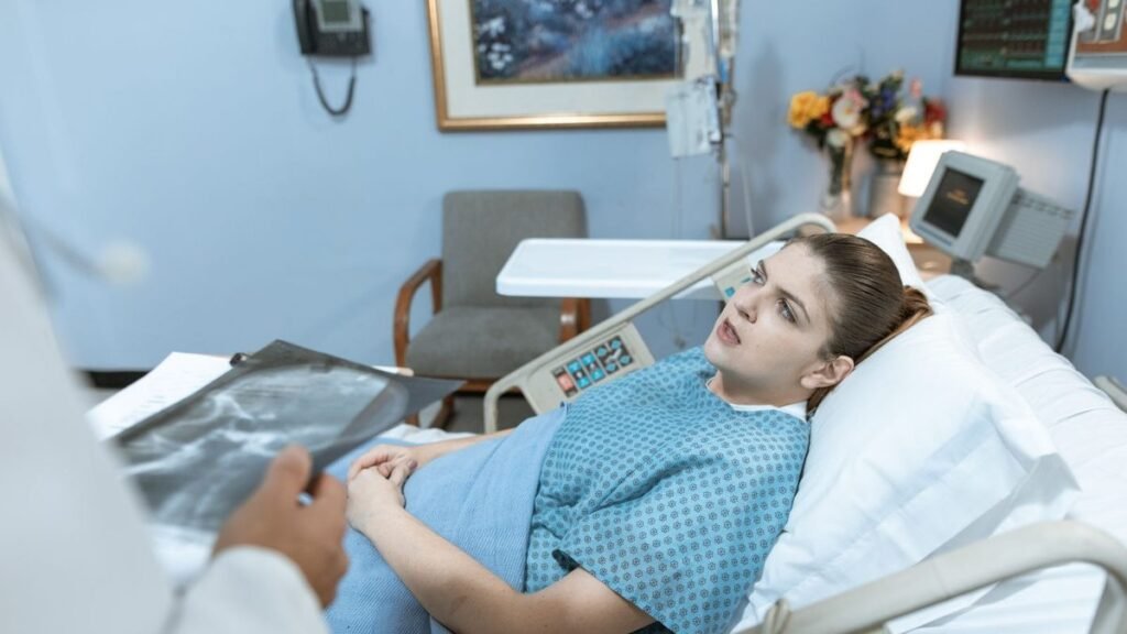 Patient resting in a hospital bed after surgery